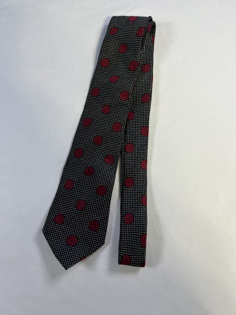 Twenty Dollar Tie Burgundy Polka Dots Dark Background